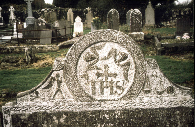 Resurrection narrative showing skull and cross-bones, Archangel Gabriel with a trumpet, a set of scales and a rosette. Overview and details.